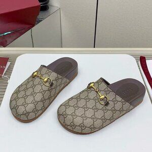 Gucci mule slippers in GG Supreme canvas